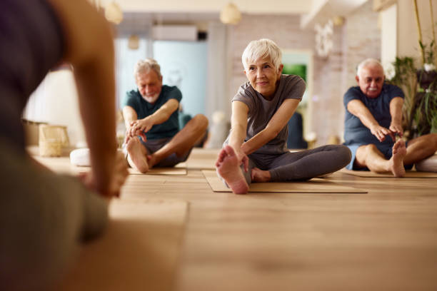 Seniors yoga stretching class